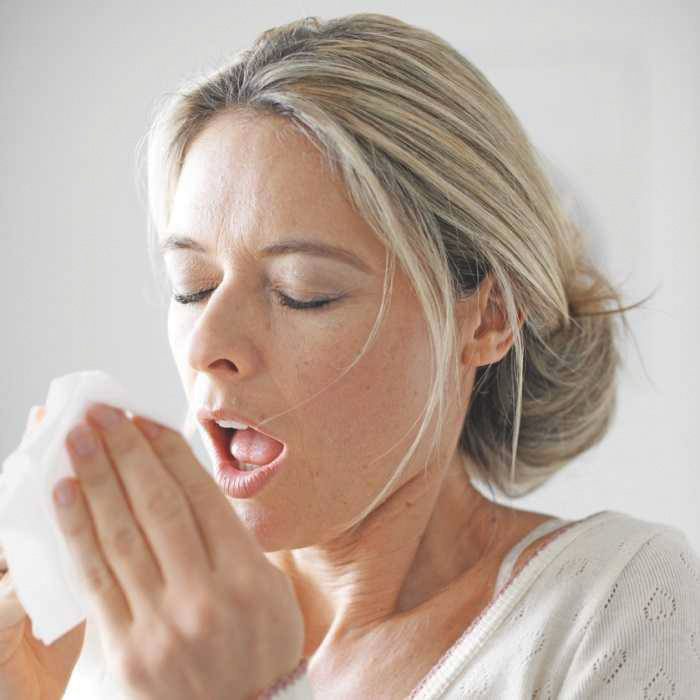 Zehnder_sneezing woman