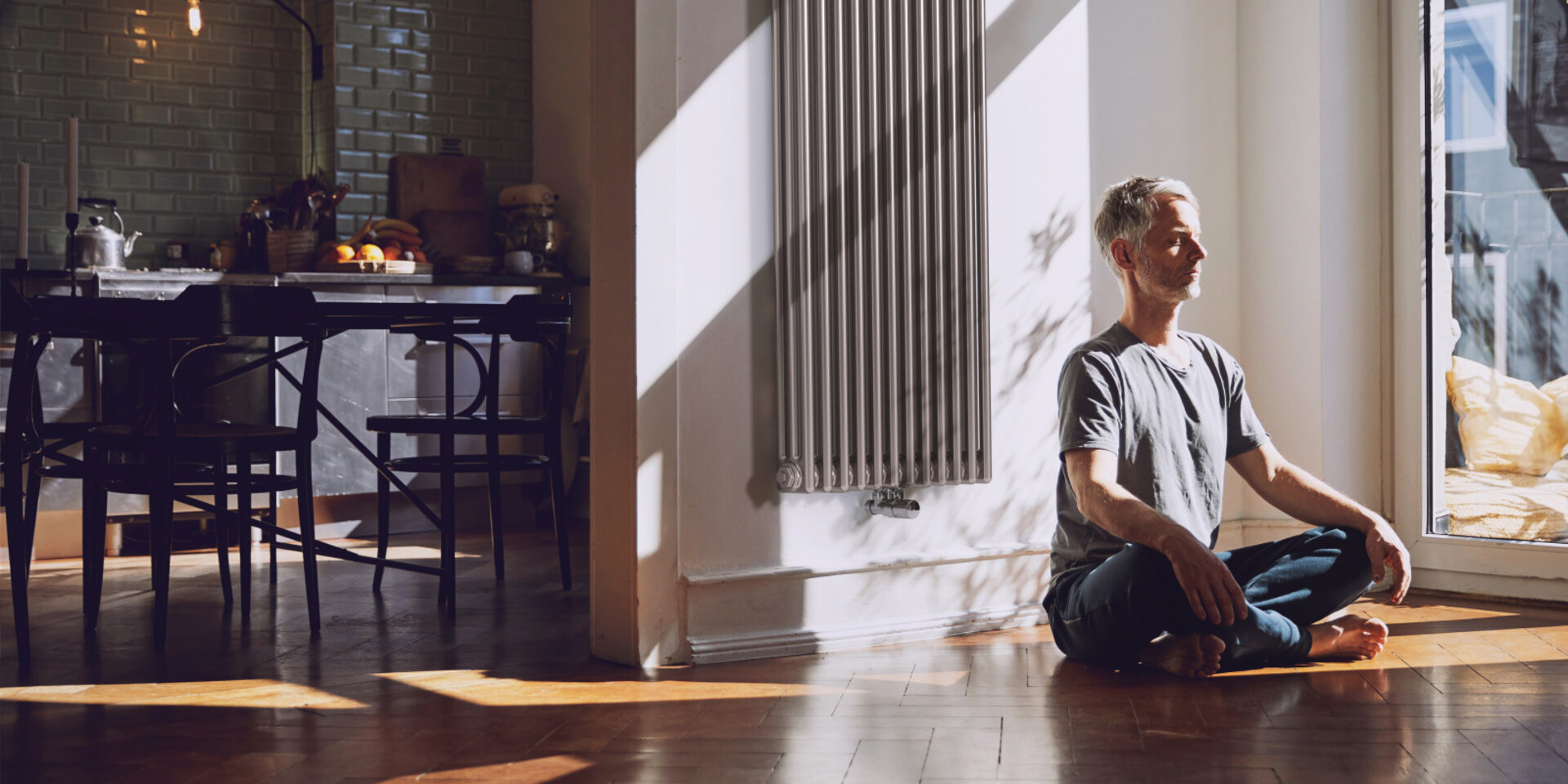 man meditates, old building flat, relaxed, charleston