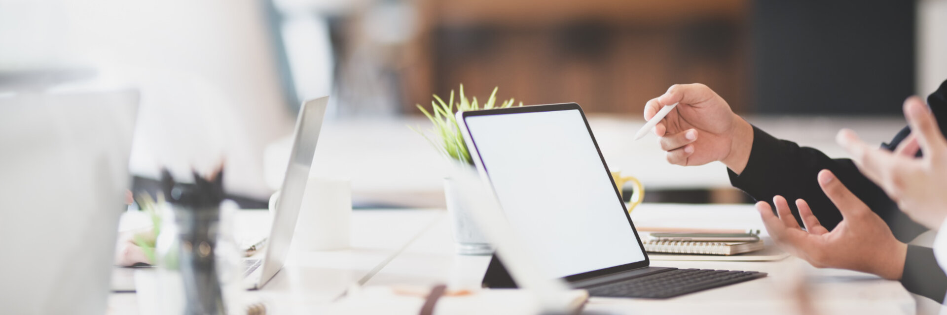 Business team briefing the idea concept before the next meeting in modern office with laptop computer